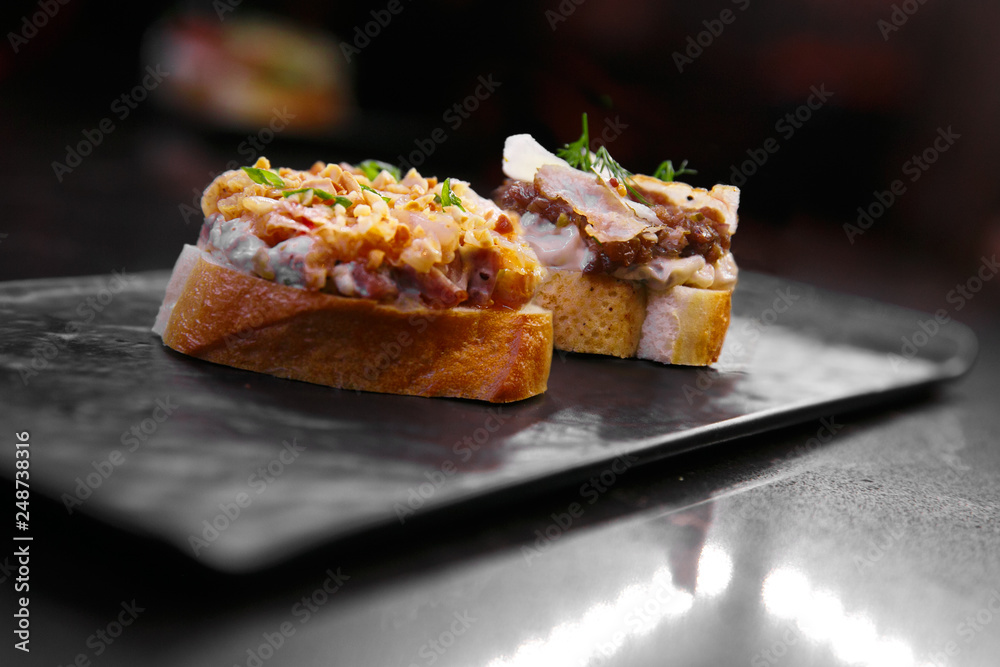 sandwiches on a black background. sandwiches on a black background.