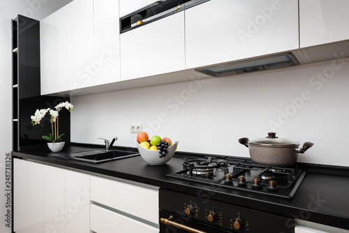 Modern classic black and white kitchen photo