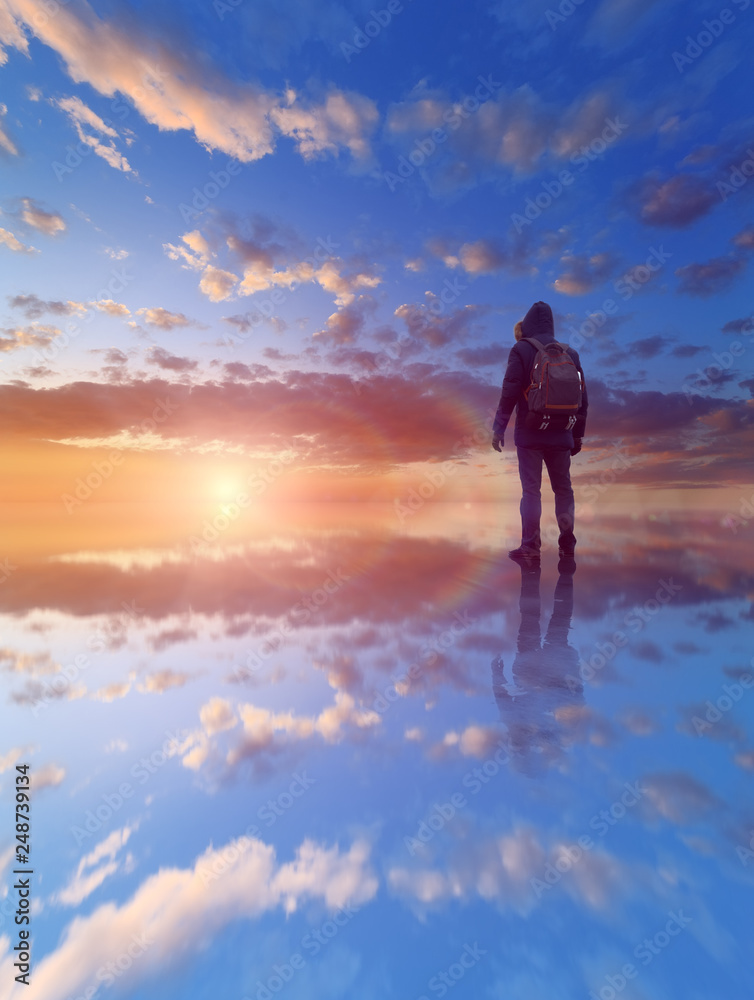 man looking at the dawn / mirror image background illustration