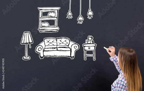 New apartment dream with young woman writing on a blackboard