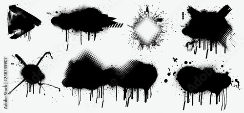Abstract black spray on white background, Black splashes isolated on white background. Spray effect, exploding, black drops. Graffiti stencil template. Grunge effect, Isolated vector collection.