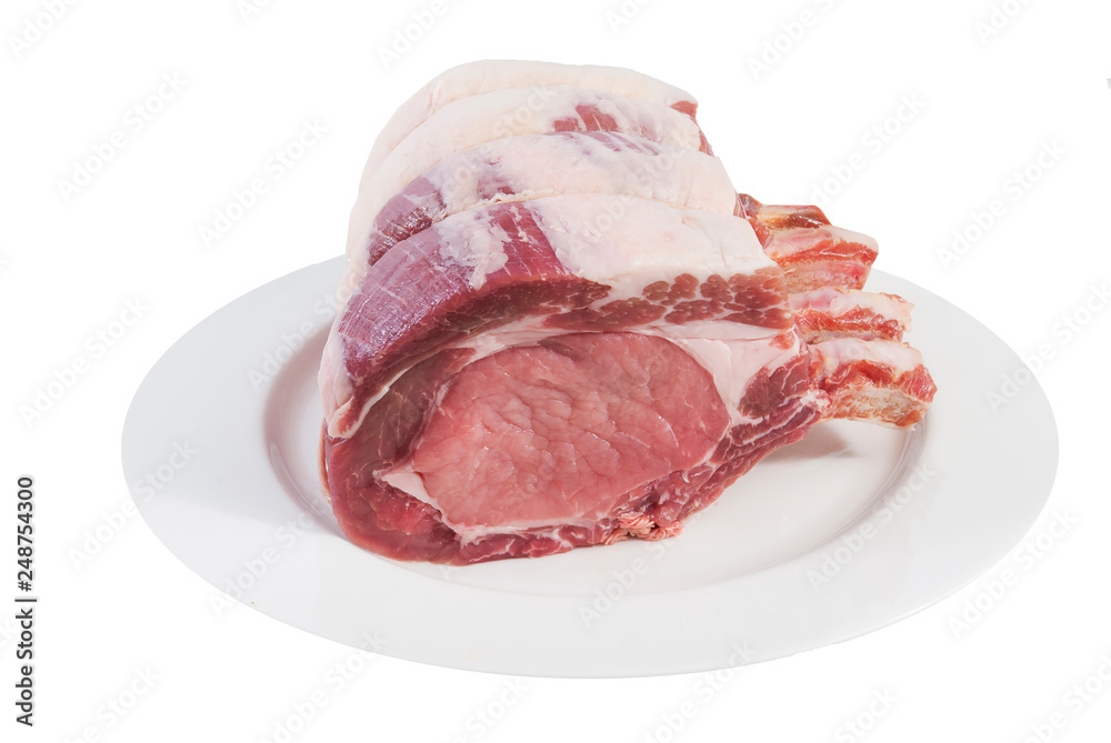 Pork rib roast on a white plate Pork rib roast on a white plate