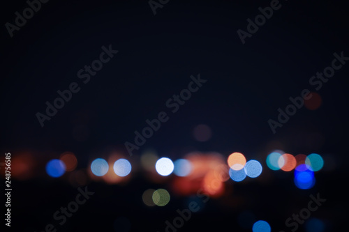 blurred light night city bokeh abstract background © arwiyada