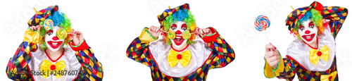 Funny male clown with lollipop