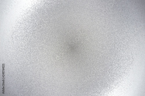 Texture of gray brushed metallic plate, abstract background