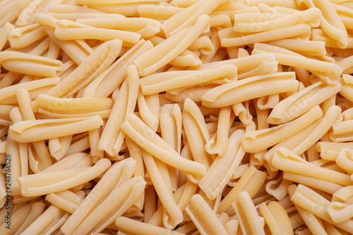 Uncooked Italian Casarecce pasta made from organic durum wheat semolina. Macaroni product.