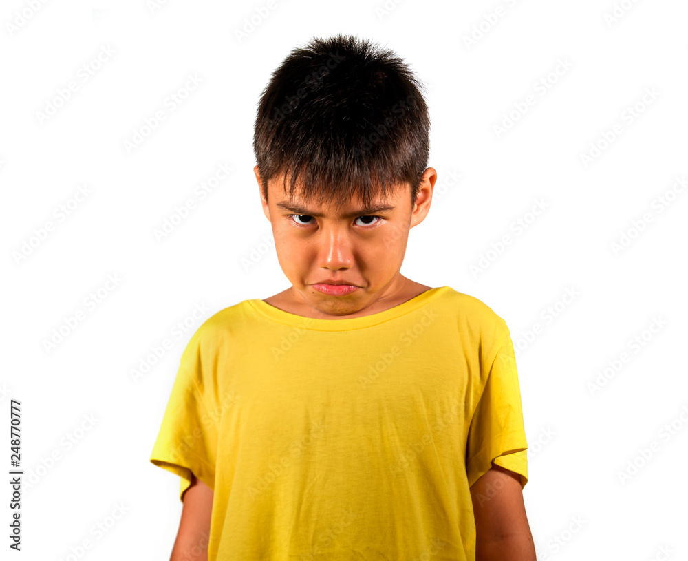 8 years old male child sad and ashamed after suffering reprimand