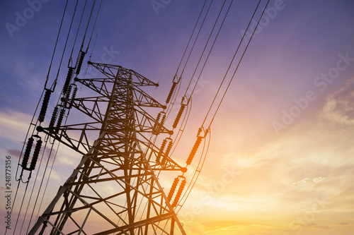 High voltage post or High voltage tower on Sunset Background.