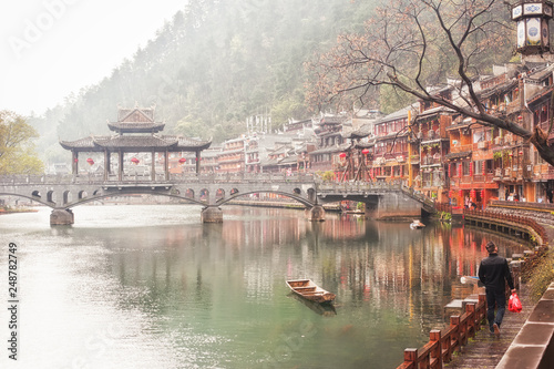 One of the traditional bridges over the Tuojiang River (Tuo Jiang River) in Fenghuang old city (Phoenix Ancient Town),Hunan Province, China.