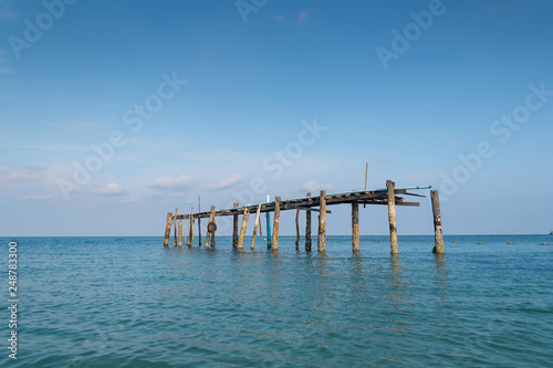 Wooen jetty was abandoned. Located by the beach Stretching into the sea.