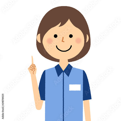 女性店員　指をさす