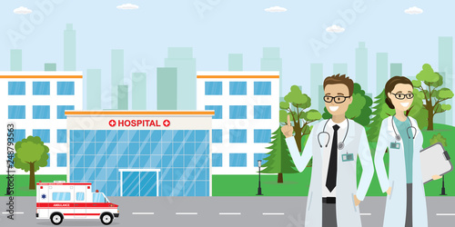 Modern Hospital building,ambulance car,couple of male and female doctors