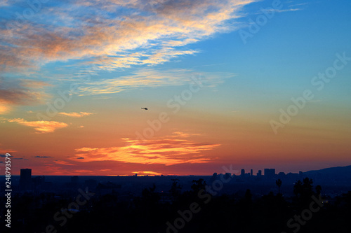 sunset over city © JAMES