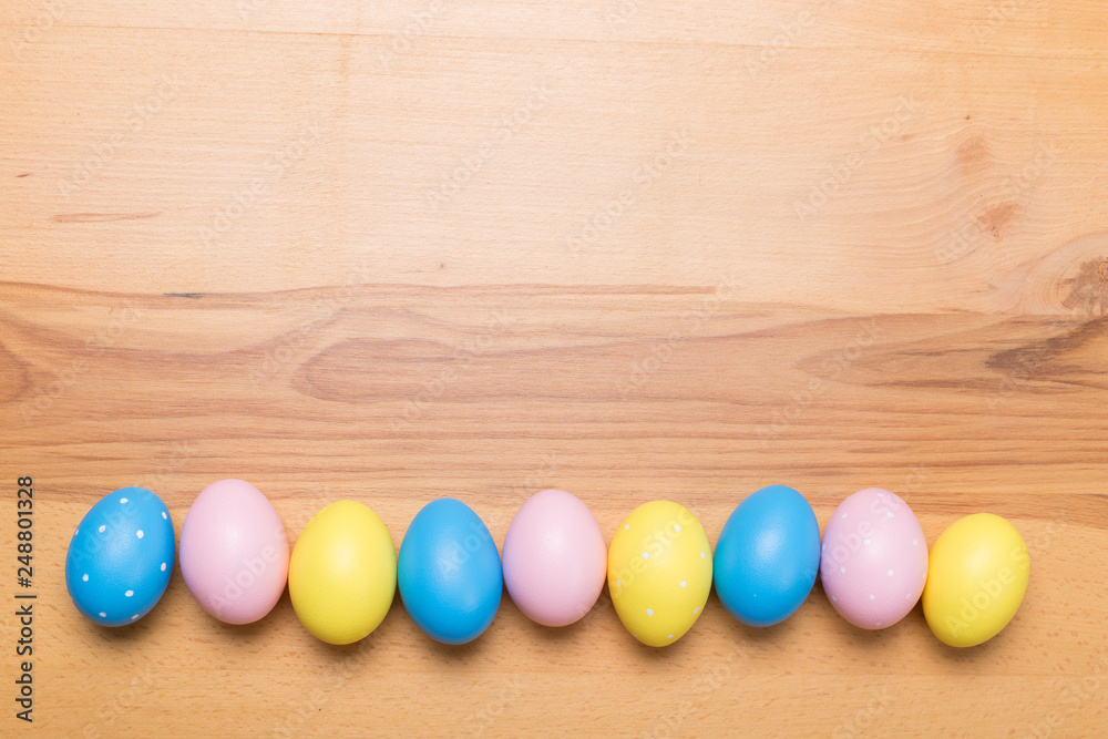 Easter eggs on wooden background