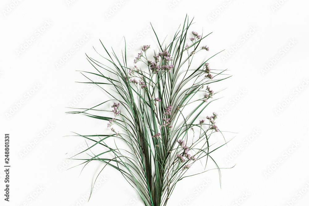 Flowers composition. Dried flowers and leaves on white background. Flat lay, top view