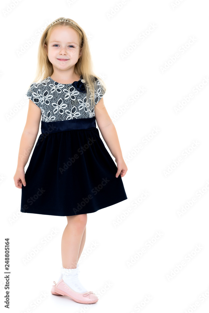 Little girl in an elegant dress. Little girl in an elegant dress.