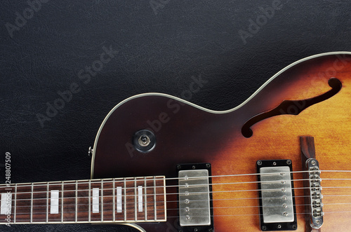 Photography Jazz guitar on a dark background. Close-up