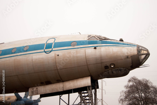  the bow of an old passenger plane in the fog