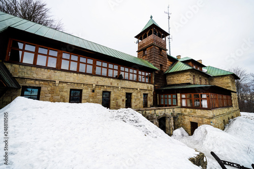 Fototapeta Naklejka Na Ścianę i Meble -  Mountain hotel standing in Beskidy mountains near Bielsko Biala city. Szyndzielnia, Beskid Slaski, Poland