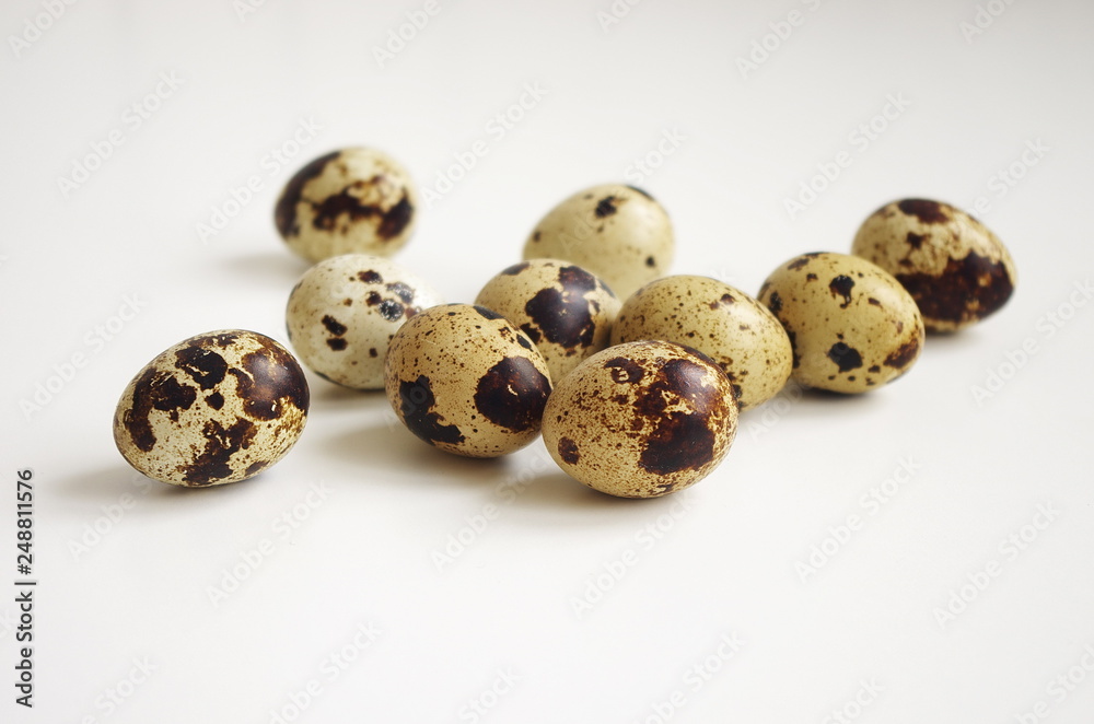 Quail eggs on white background , healthy and diet food, protein concept