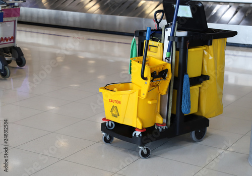 Closeup of janitorial, cleaning equipment and tools for floor cleaning at the airport. 
