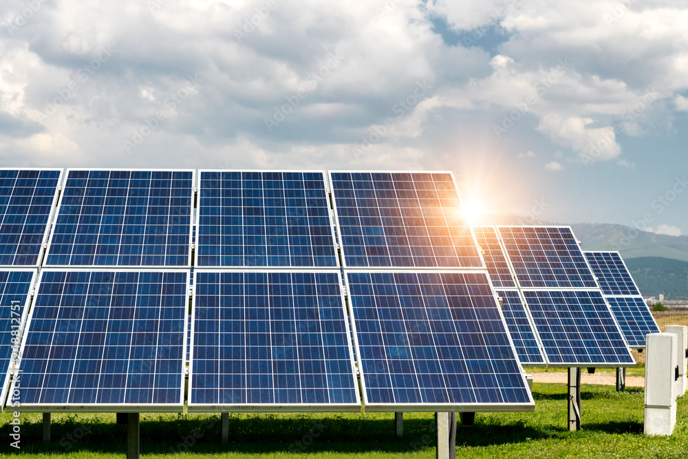 Solar panels, photovoltaics, alternative electricity source - concept of sustainable resources Solar panels, photovoltaics, alternative electricity source - concept of sustainable resources