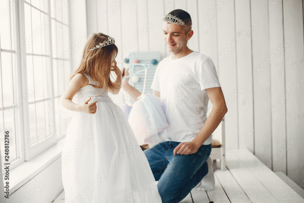 Family at home. Little girl playing with a father. Family at home. Little girl playing with a father.