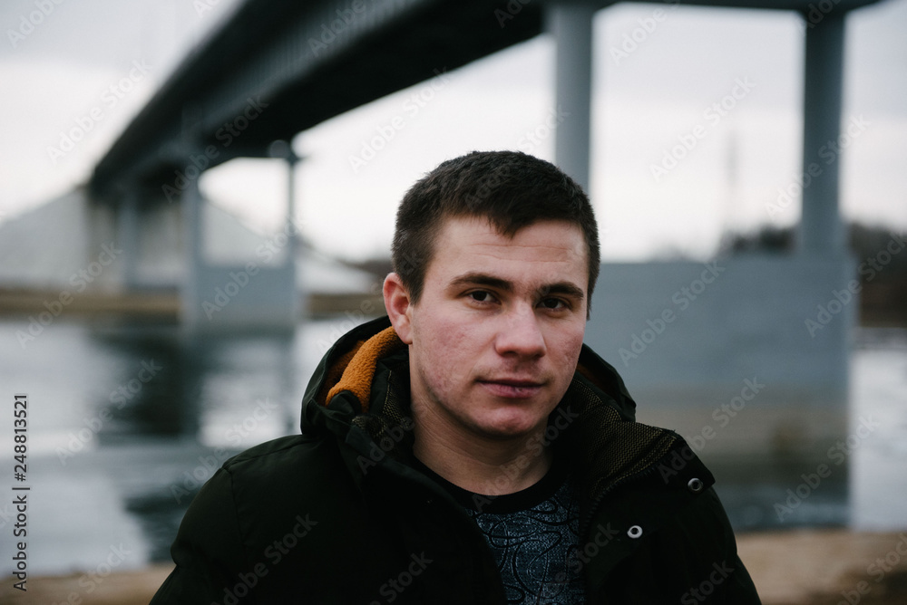 portrait of a young man of Caucasian ethnicity on the street portrait of a young man of Caucasian ethnicity on the street
