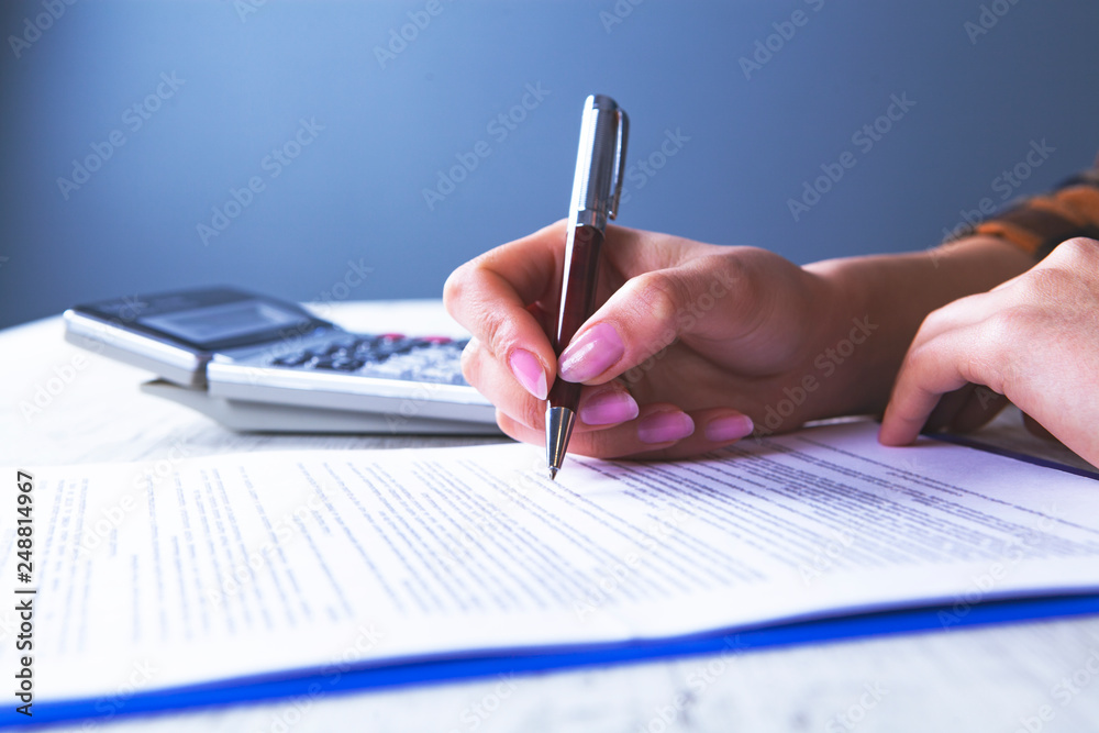 businesswoman calculator documents businesswoman calculator documents