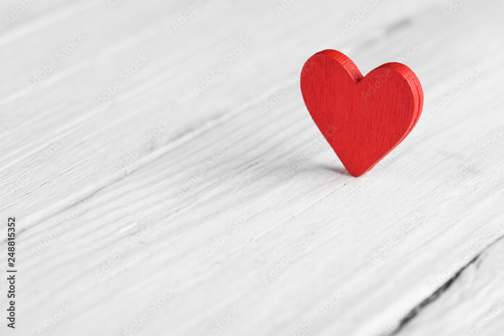 Valentine background with handmade hearts on rustic wood Valentine background with handmade hearts on rustic wood