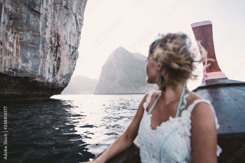 Beautiful woman making an excursion to phi phi island in Thailand