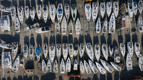 Aerial drone top view photo of mediterranean shipyard and port with yachts and sailboats by the sea