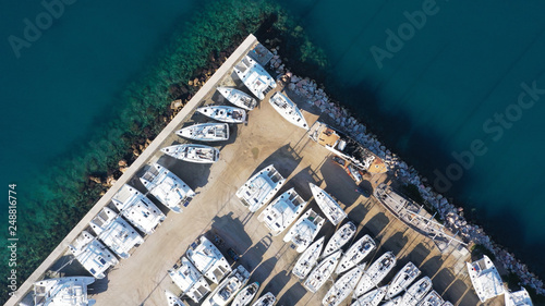 Aerial drone top view photo of mediterranean shipyard and port with yachts and sailboats by the sea