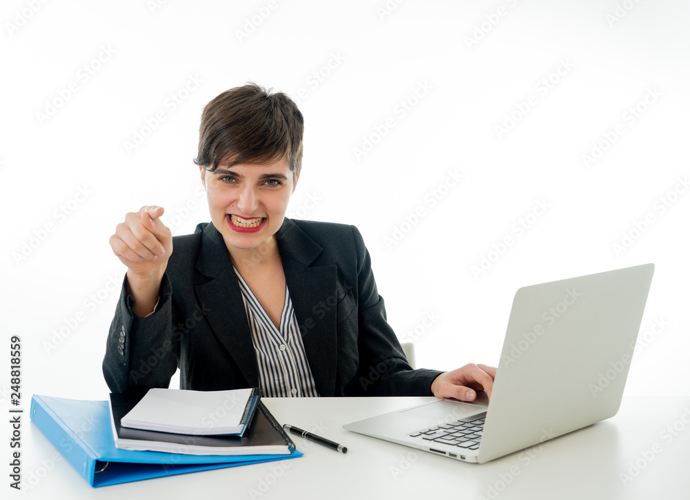 Portrait of happy attractive young businesswoman working on her laptop looking confident Portrait of happy attractive young businesswoman working on her laptop looking confident