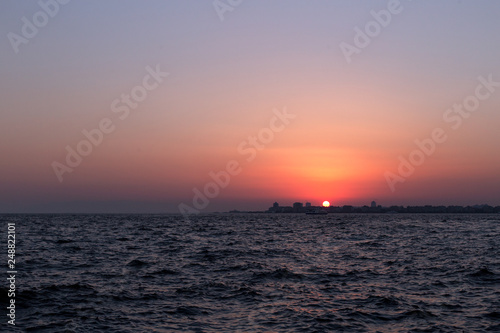 sunset over the sea © ozgur