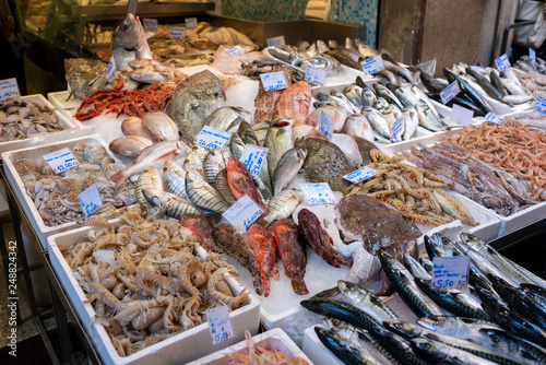 Fish and seafood stall in a street market in the historic center of Bologna