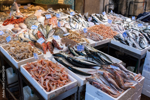 Fototapeta Naklejka Na Ścianę i Meble -  Fish and seafood stall in a street market in the historic center of Bologna