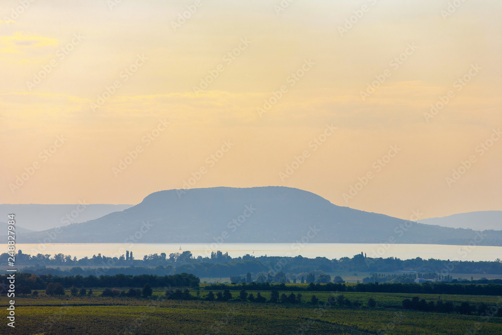 Obraz premium he Badacsony mountain with Lake Balaton at sunset in Hungary
