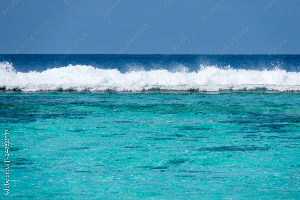 Blue sky and turquoise ocean