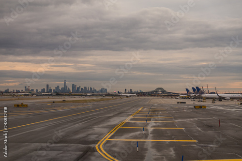 Newark, New Jersey, USA, January 2019, Newark Liberty International Airport apron view with the Manhattan skyline in the background  photo