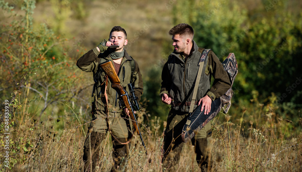 Hunting skills and weapon equipment. How turn hunting into hobby. Friendship of men hunters. Army forces. Camouflage. Military uniform fashion. Man hunters with rifle gun. Boot camp. time to relax Hunting skills and weapon equipment. How turn hunting into hobby. Friendship of men hunters. Army forces. Camouflage. Military uniform fashion. Man hunters with rifle gun. Boot camp. time to relax