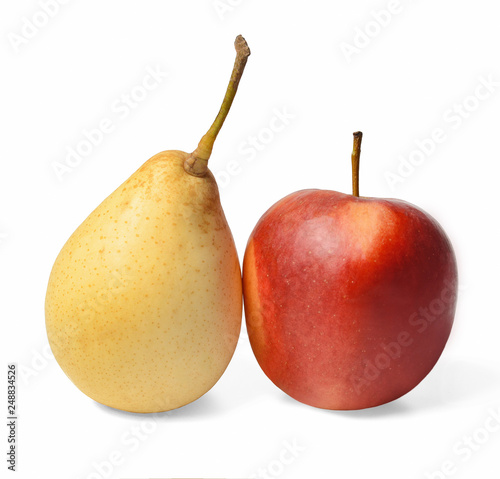Chinese pear and red apple with sprigs on white isolated background. Shadow. Close-up.