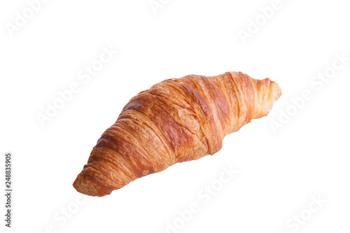 Fresh and tasty croissant over white background