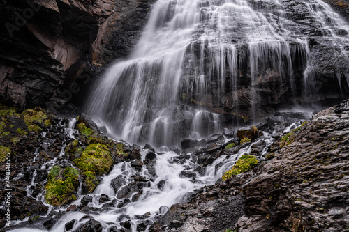 Fototapeta Naklejka Na Ścianę i Meble -  The waterfall of the girl's braids in the Elbrus region near the village of Terskol