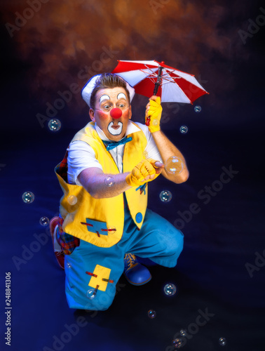 A funny clown with smiling joyful expression