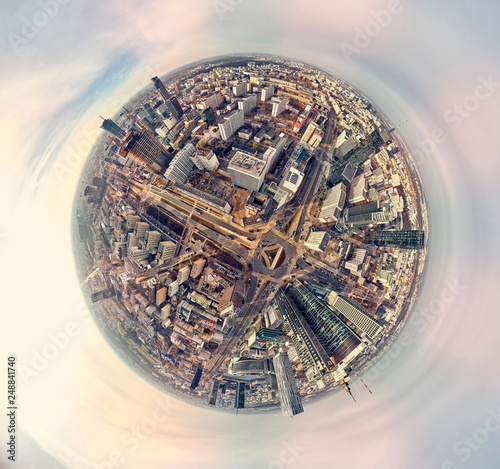 WARSAW  POLAND - FEBRUARY 10  2019  Beautiful panoramic aerial drone view  little planet  - 360 degree panorama - to Warsaw modern City and  Rondo 1  office skyscraper located at Rondo ONZ