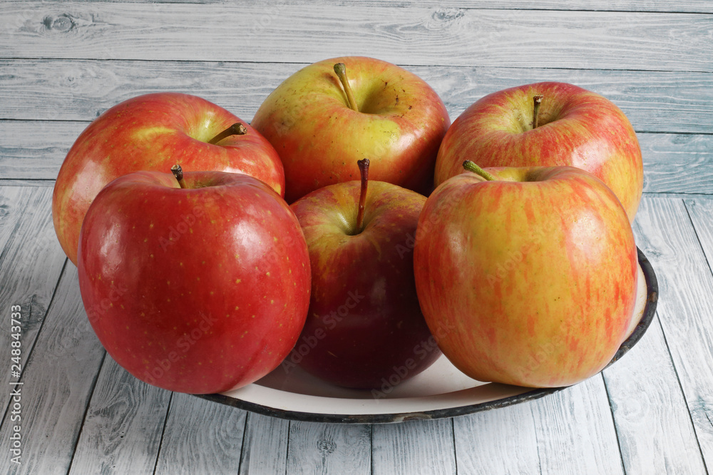 Fresh red apples on white wooden background Fresh red apples on white wooden background