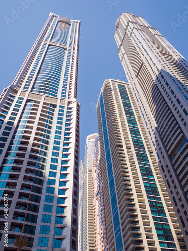 High-rise skyscrapers with blue sky of Dubai city. UAE. © Довидович Михаил