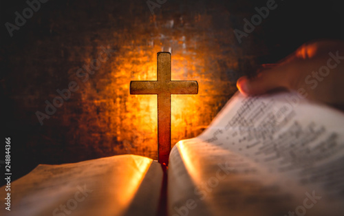 Canvas Print Opening Bible with cross of jesus. christian concept.