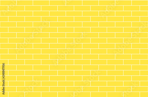 Yellow brick wall, abstract seamless background
